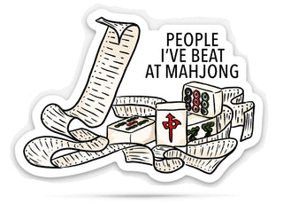 Hand-drawn die-cut sticker reading "People I've beat at Mahjong" above a long list of names circling a set of mahjong tiles.