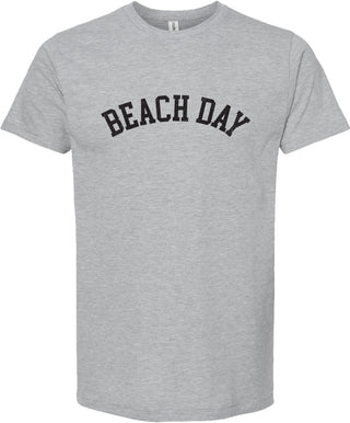 Light gray t-shirt with 'Beach day' printed in black ink.