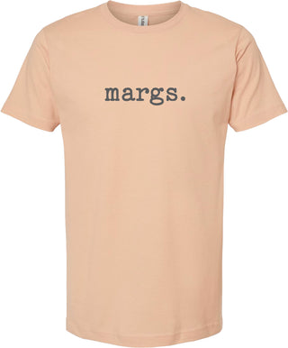 Peach t-shirt with 'margs.' printed in gray ink.