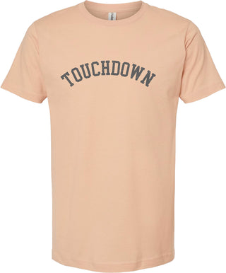 Peach t-shirt with 'TOUCHDOWN' printed in gray ink.