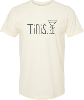 Cream t-shirt with 'Tinis.' and a martini glass graphic printed in gray ink.