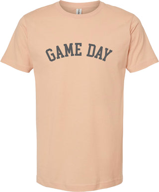 Peach colored t-shirt with 'Game day' printed in gray ink.