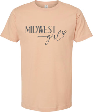 Peach t-shirt with 'Midwest girl' printed in gray ink.