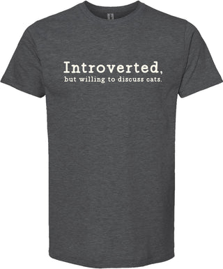 Dark gray t-shirt with text 'Introverted, but willing to discuss cats' printed in cream ink.