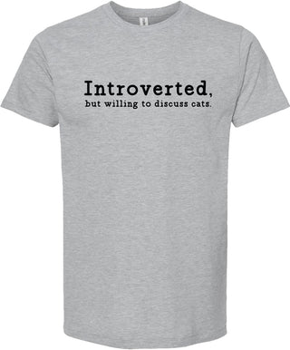 Light gray t-shirt with text 'Introverted, but willing to discuss cats' printed in black ink.