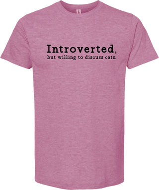 Raspberry t-shirt with text 'Introverted, but willing to discuss cats' printed in black ink.