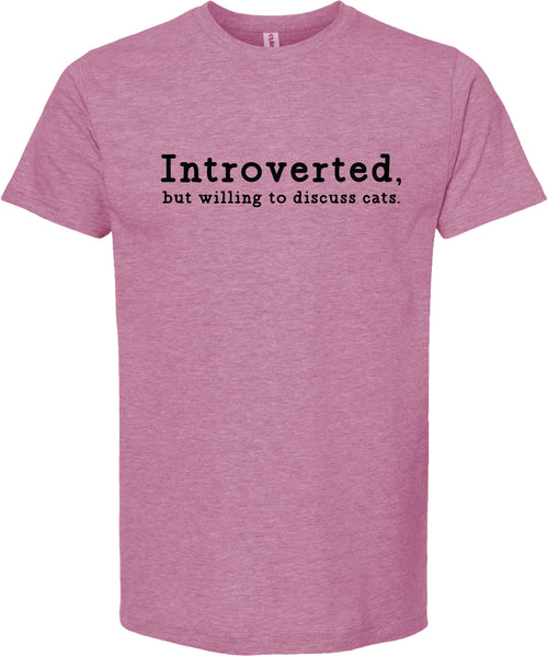 Raspberry t-shirt with text 'Introverted, but willing to discuss cats' printed in black ink.