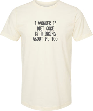 Cream t-shirt with humorous text 'I wonder if diet coke is thinking about me too' printed in gray ink.