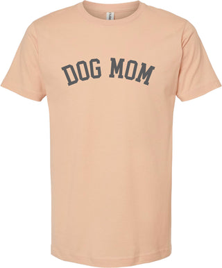 Peach t-shirt with 'DOG MOM' test printed in gray ink.