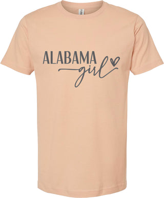 Peach unisex t-shirt with "Alabama girl" printed on the front.