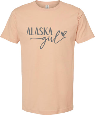 Peach t-shirt with 'Alaska Girl' text on a white background