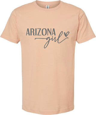 Peach t-shirt with 'Arizona girl' text on a white background