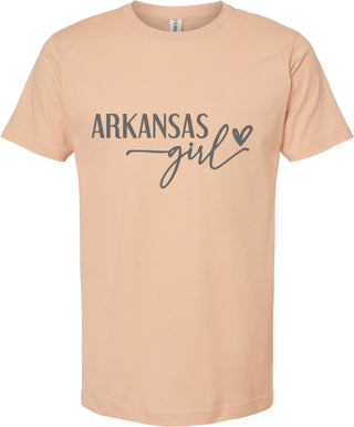 Peach t-shirt with 'ARKANSAS girl' text on a white background