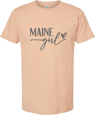 Peach t-shirt with 'MAINE girl' text on a white background