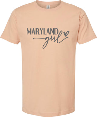Peach t-shirt with 'Maryland girl' text on a white background