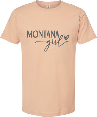Peach t-shirt with 'Montana girl' text on a white background