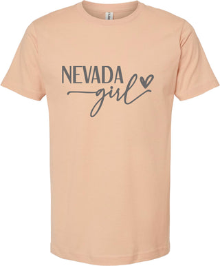 Peach t-shirt with 'NEVADA girl' text on a white background