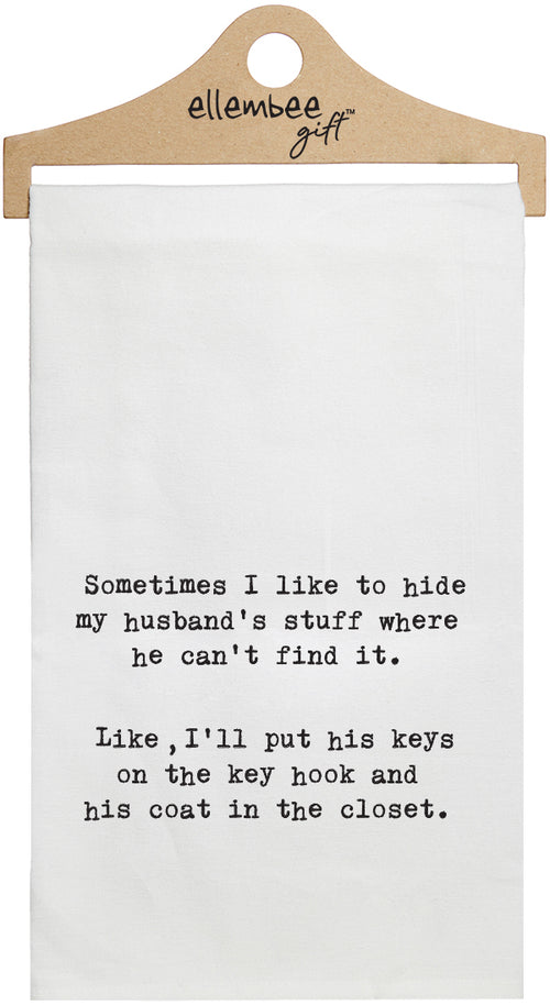 Sometimes I like to hide my husband's stuff where he can't find it.  Like I'll put his keys on the key hook and his coat in the closet - white kitchen tea towel