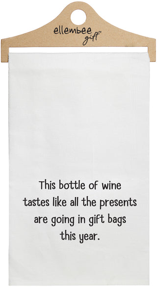 This bottle of wine tastes like all the presents are going in gift bags this year - white kitchen tea towel