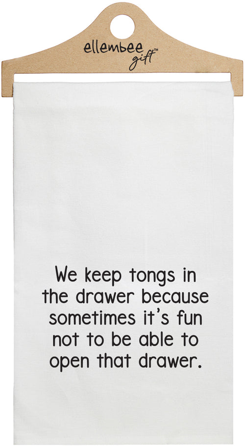 We keep tongs in the drawer because sometimes it's fun to not be able to open that drawer - white kitchen tea towel