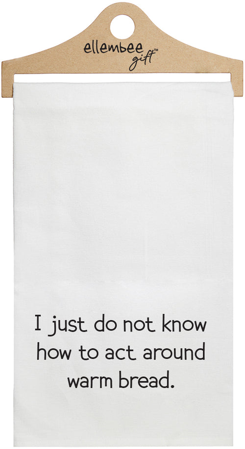 White towel with printed text 'I just do not know how to act around warm bread.' printed in black ink.