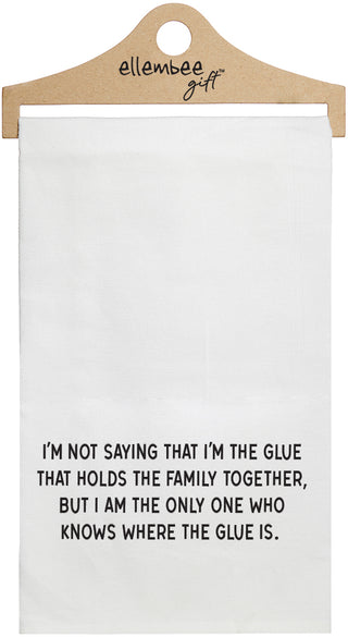 White towel with printed text 'I'm not saying that I'm the glue that holds the family together, but I am the only one who knows where the glue is.' printed in black ink.