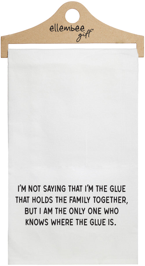 White towel with printed text 'I'm not saying that I'm the glue that holds the family together, but I am the only one who knows where the glue is.' printed in black ink.