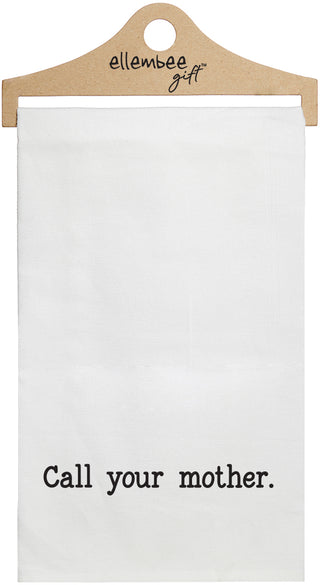 White towel with printed text 'Call your mother' printed in black ink.