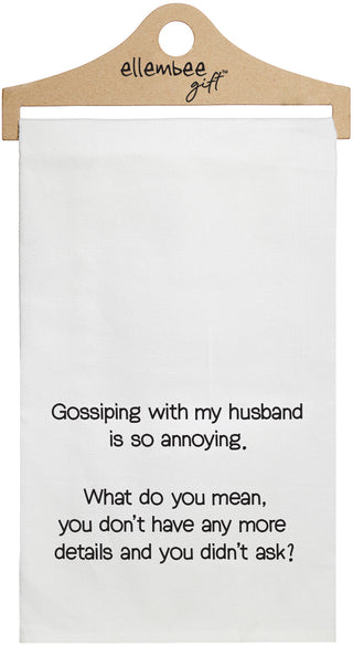 White towel with printed text 'Gossiping with my husband is so annoying. What do you mean you don't have any more details and you didn't ask?' printed in black ink.