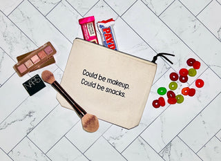 Could be makeup. Could be snacks. everyday bag