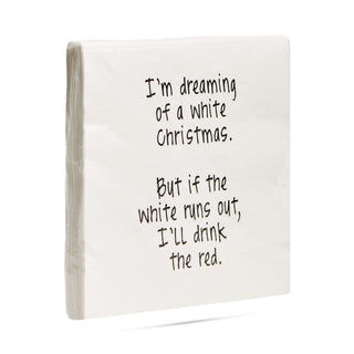Side view of pack of white 3-ply cocktail napkin printed in black with "I'm dreaming of a white Christmas. But if the white runs out, I'll drink the red."