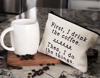 Second view of the "first I drink the coffee" canvas zipper pouch.