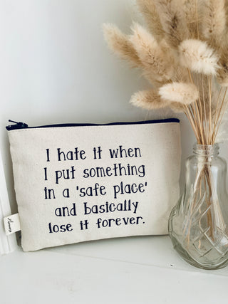 Lifestyle shot of the "safe place" canvas zipper pouch.